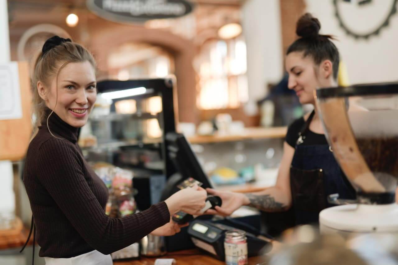 finding your ideal customer woman in coffee shop